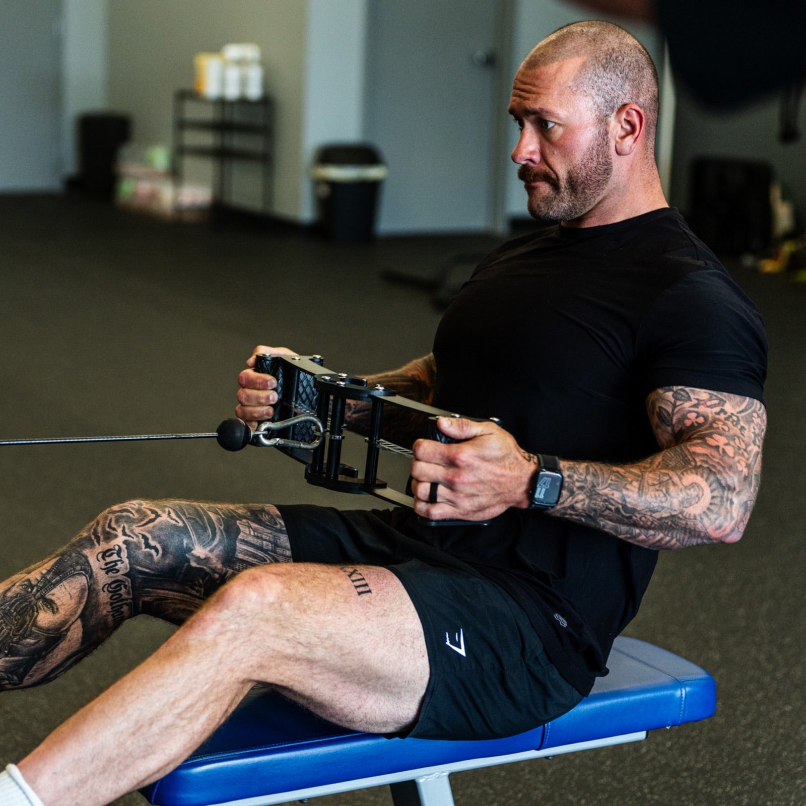 Athlete pulling on the Back Bar's wide grip positions